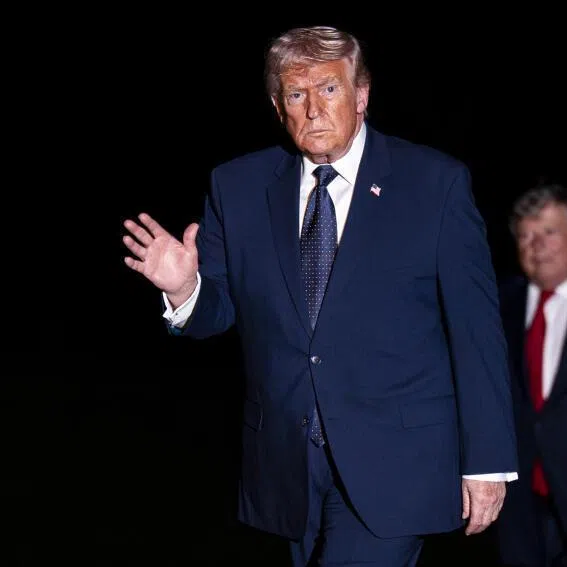 US President Donald Trump arrives on the South Lawn of the White House, following a weekend trip to Florida, in Washington, March 9, 2026.