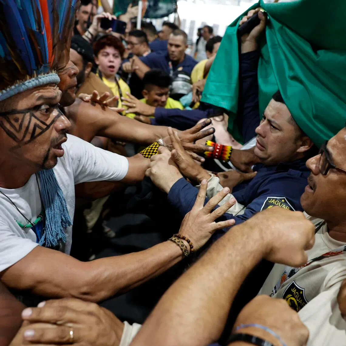 Protesters clashing with security personnel at the COP30 climate talks on Nov 11 in Belem, Brazil.