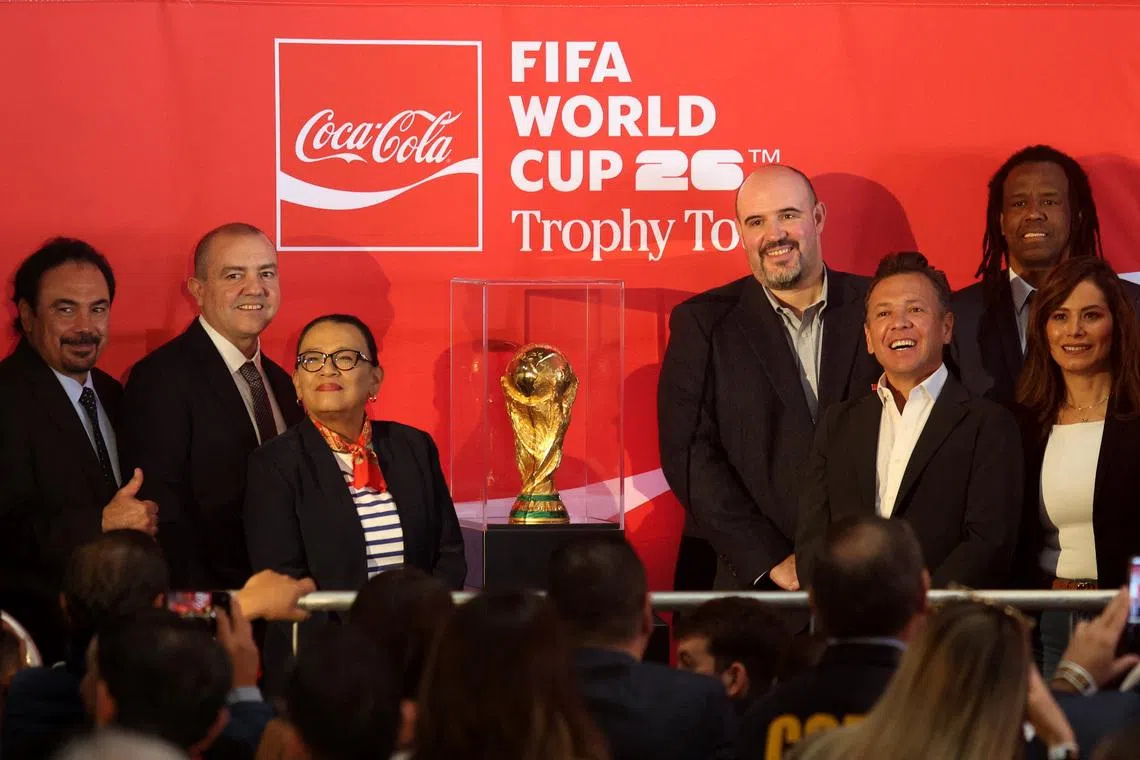 Soccer Football - FIFA World Cup - Trophy on display in Guadalajara - Akron Stadium, Guadalajara, Mexico - February 28, 2026 Former footballers Roque Junior and Hugo Sanchez, Director of Arca Continental Jean Claude Tissot, Secretary of the Interior of Mexico Rosa Icela Rodriguez Velazquez, Vice President and General Manager of the Coca-Cola Company Mexico North Carlos Ricalde Alcocer, Governor of Jalisco Pablo Lemus, and Mayor of Guadalajara Veronica Delgadillo pose with the FIFA World Cup trophy REUTERS/Michelle Freyria