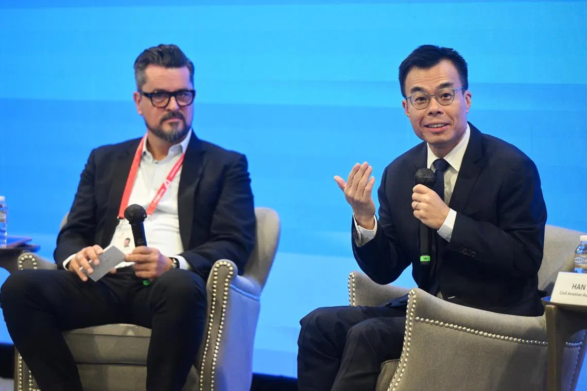 CAAS director-general Han Kok Juan (right) at a dialogue moderated by Mr Oliver Plogmann, a partner at McKinsey & Company Singapore.