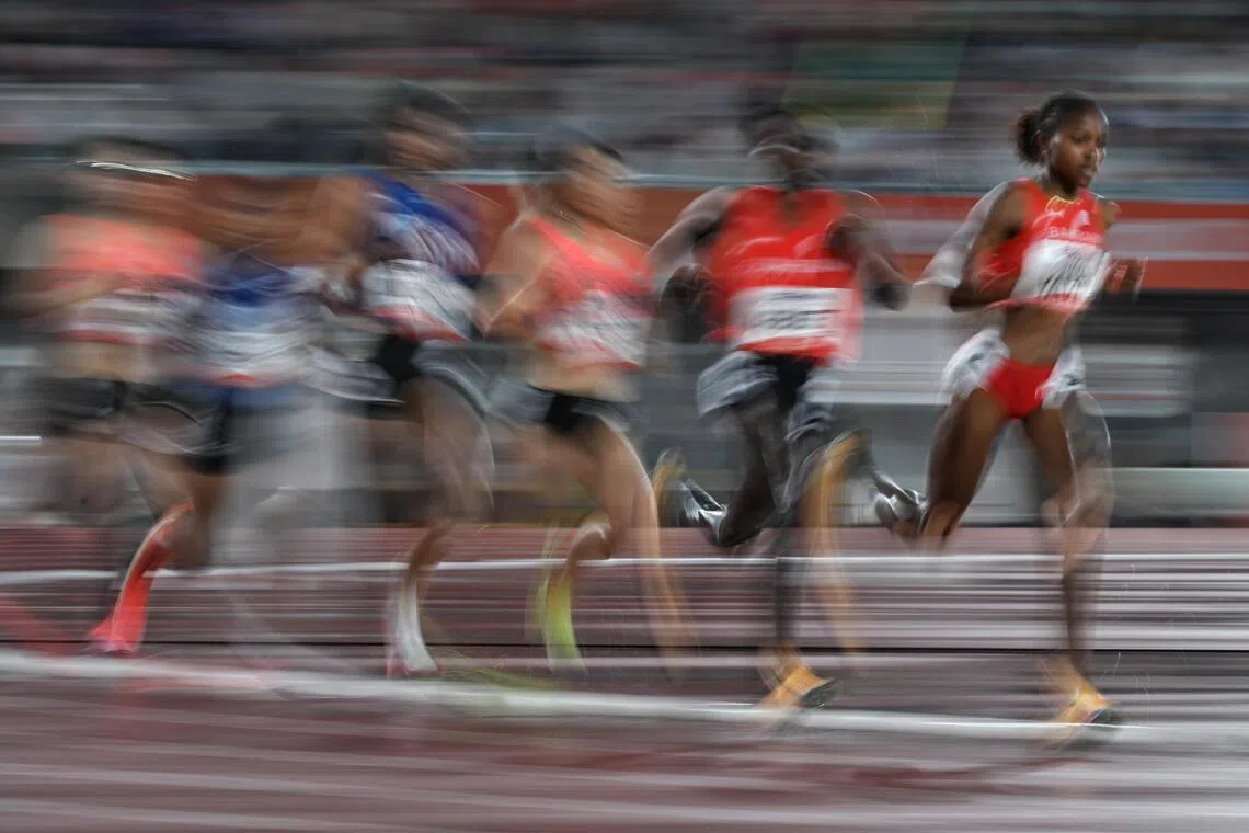 Winfred Yavi (right) of Bahrain in action during the Asian Games Women?s 5000m final at the Paloma Mizuho Stadium on Sept 28, 2026.