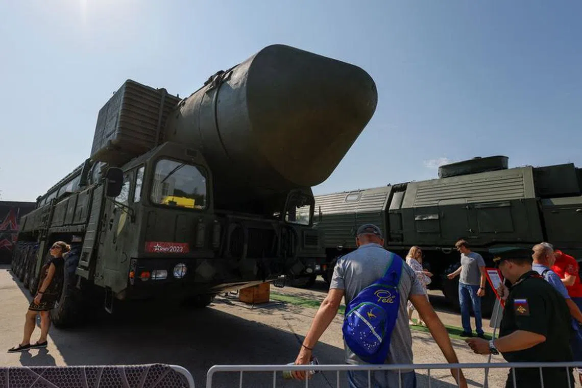 FILE PHOTO: Visitors gather near a Russian Yars intercontinental ballistic missile system at an exposition of the international military-technical forum Army-2023 at Patriot Congress and Exhibition Centre in the Moscow region, Russia, August 18, 2023. REUTERS/Stringer/File photo