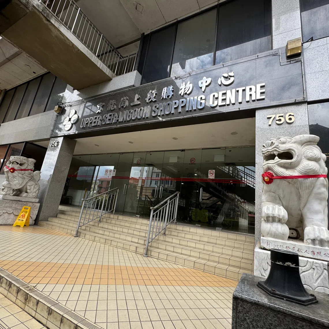 The woman was subdued by members of the public.