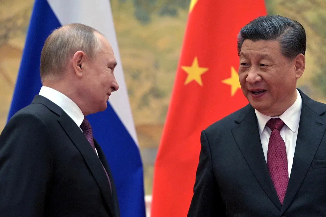 Russian President Vladimir Putin attends a meeting with Chinese President Xi Jinping in Beijing, China, on Feb 4, 2022. 