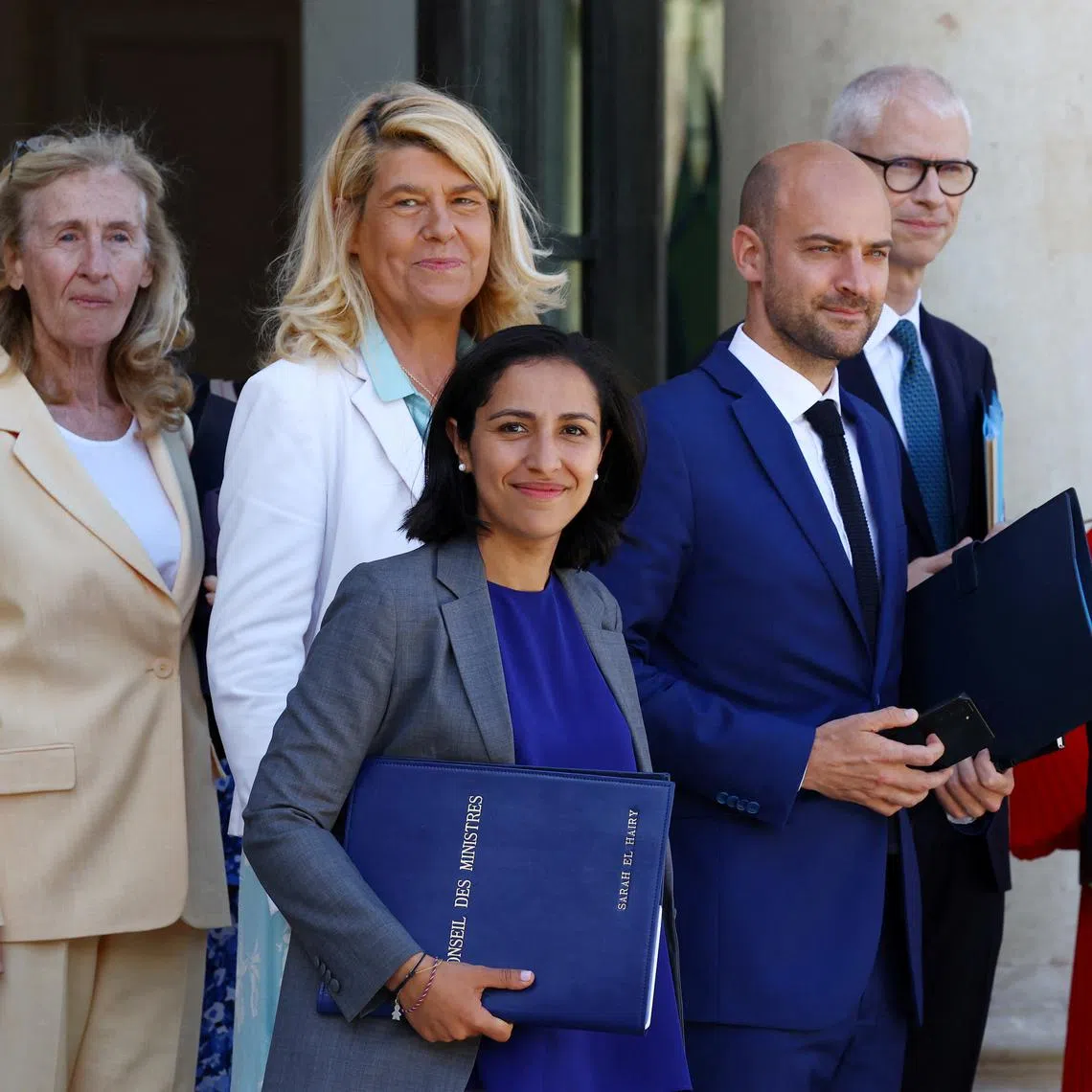 French Junior Minister for the Sea and Biodiversity Herve Berville, Education and Youth Minister Nicole Belloubet, Junior Minister for Territorial Communities and Rural Affairs Dominique Faure,  Junior Minister for Children, Youth and Families Sarah El Hairy, Junior Minister for Europe Jean-Noel Barrot, Junior Minister for Foreign Trade, Attractiveness, Francophonie and French People Living Abroad Franck Riester, and Junior Minister for Industry and Energy Roland Lescure leave following the weekly cabinet meeting at the Elysee Palace in Paris, France, July 16, 2024. REUTERS/Stephanie Lecocq