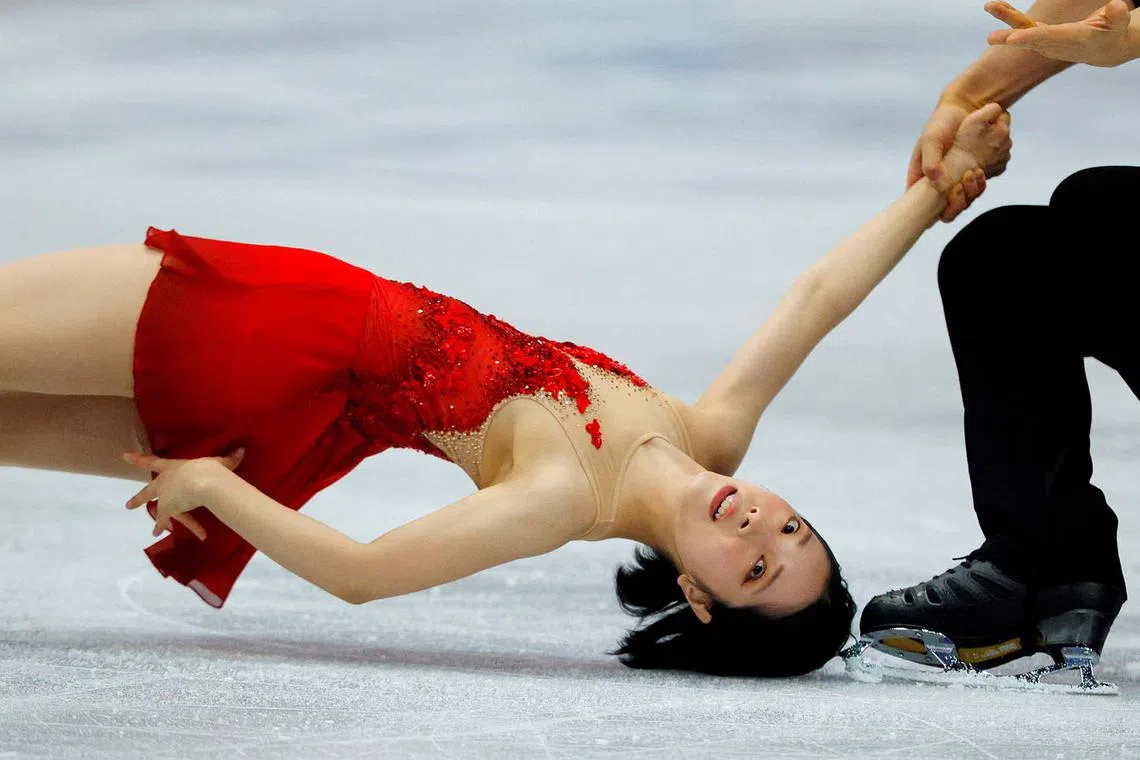 Figure Skating - ISU World Championships - TD Garden, Boston, Massachusetts, U.S. - March 27, 2025 Japan's Riku Miura and Ryuichi Kihara perform during the pairs free skating REUTERS/Brian Snyder TPX IMAGES OF THE DAY