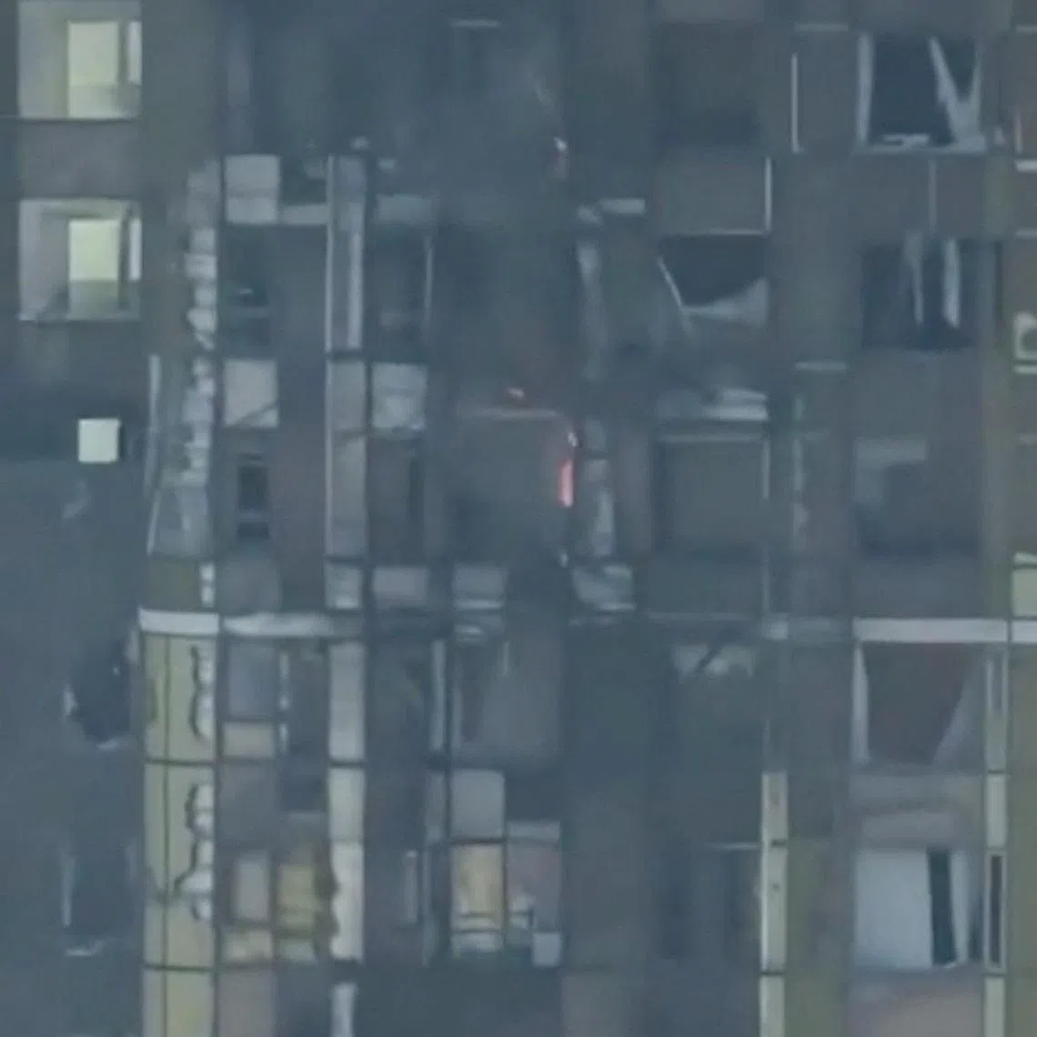 Smoke and fire in a building after it was struck by a drone, in the course of the Russia-Ukraine conflict, in Yekaterinburg, Sverdlovsk region, Russia, in this picture obtained from social media video released April 25, 2026. Social Media/via REUTERS