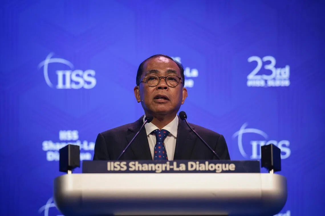 Malaysia Defence Minister Khaled Nordin speaking at a plenary session on managing regional tensions amid global competition at the Shangri-La Dialogue on May 31.