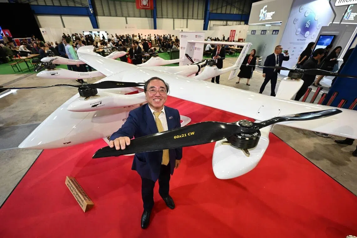 Professor James Wang with the electric vertical take-off and landing (eVTOL) prototype by NTU on Feb 3.