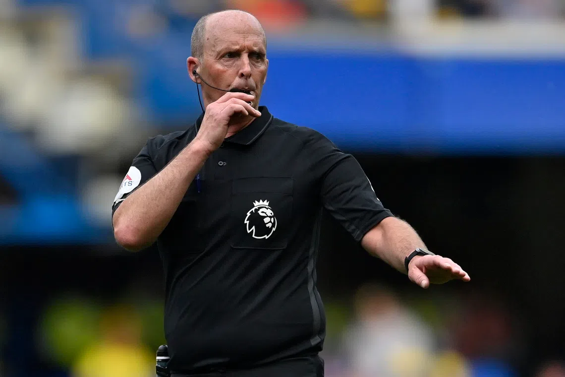 Mike Dean admitted he played “games” such as seeing how long he could go without having to blow the whistle during matches.