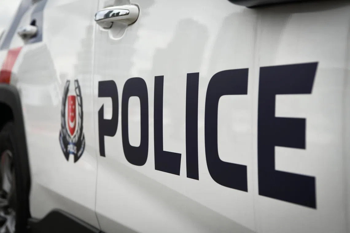 The Singapore Police Force logo.