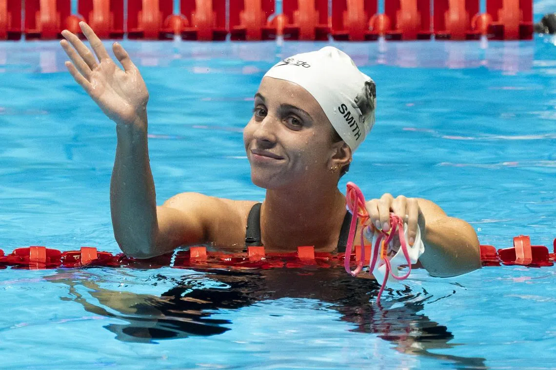Regan Smith waves to the crowd after her heat win in 100 meter backstroke prelims Monday, June 17, 2024, during U.S. Olympic Team Swimming Trials at Lucas Oil Stadium in Indianapolis. Mandatory Credit: Mykal McEldowney-USA TODAY Sports/ File Photo