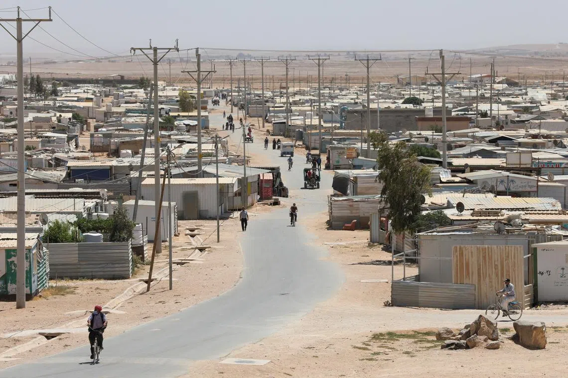 Syrian refugees are seen at the Zaatari refugee camp in the Jordanian city of Mafraq, near the border with Syria, Jordan June 17, 2021.  REUTERS/Alaa Al Sukhni/FILE PHOTO