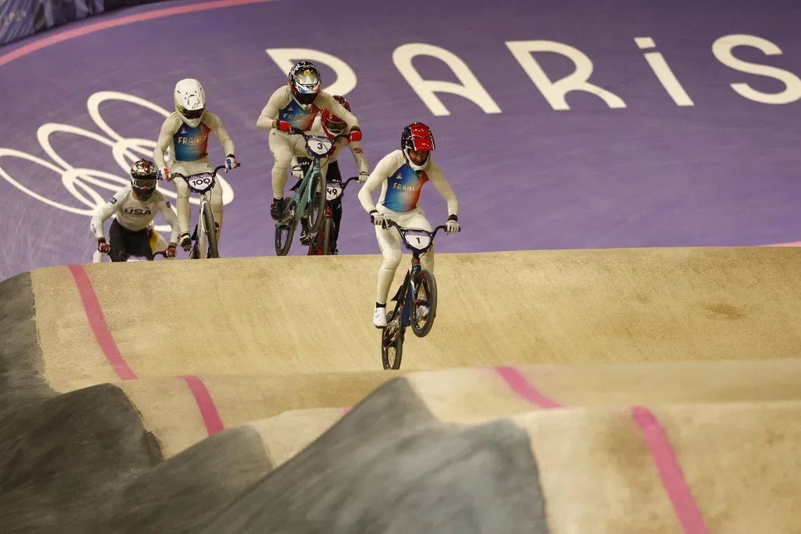 Paris 2024 Olympics - BMX Racing - Men, Final - Saint-Quentin-en-Yvelines BMX Stadium, Montigny-le-Bretonneux, France - August 02, 2024. Romain Mahieu of France, Joris Daudet of France and Sylvain Andre of France in action. REUTERS/Gonzalo Fuentes
