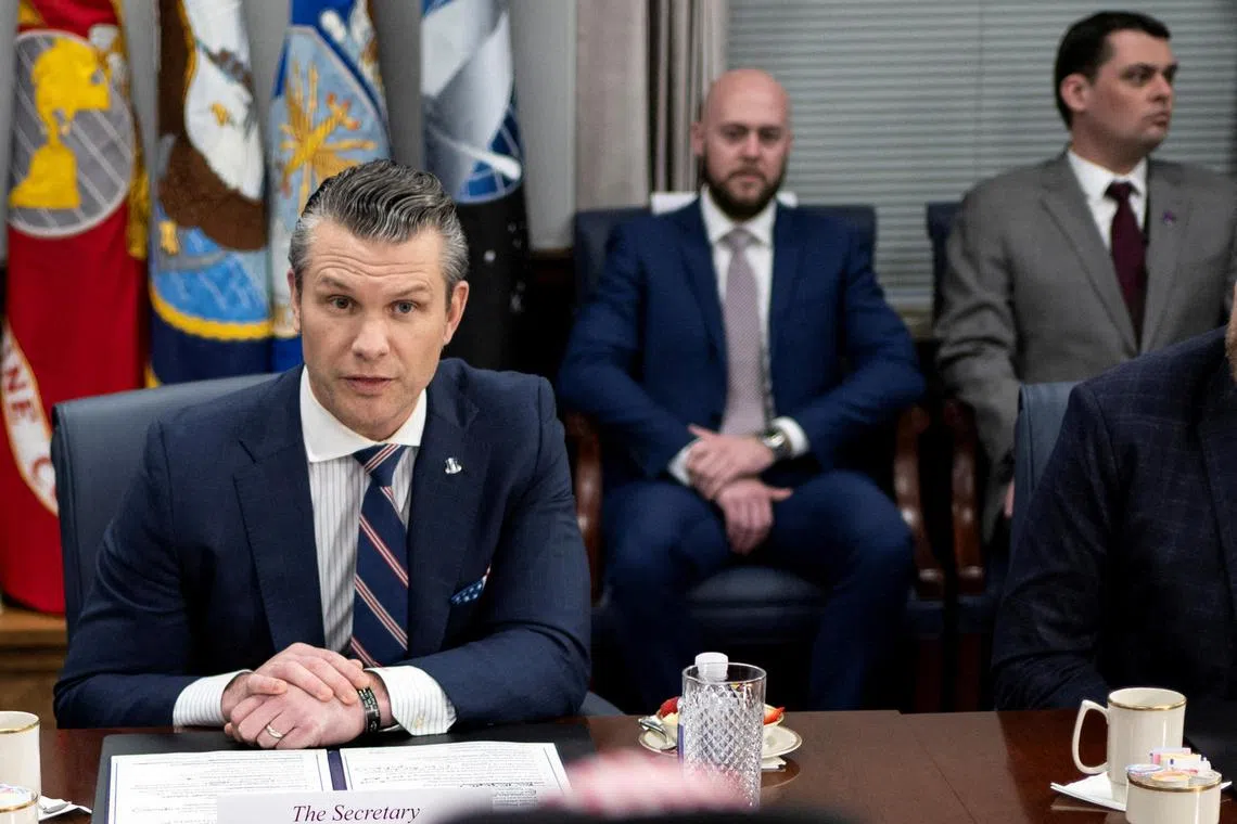 Mr Dan Caldwell (right) once one of US Defense Secretary Pete Hegseth, said in a joint statement with two other ousted officials that they have been "slandered... with baseless attacks.”