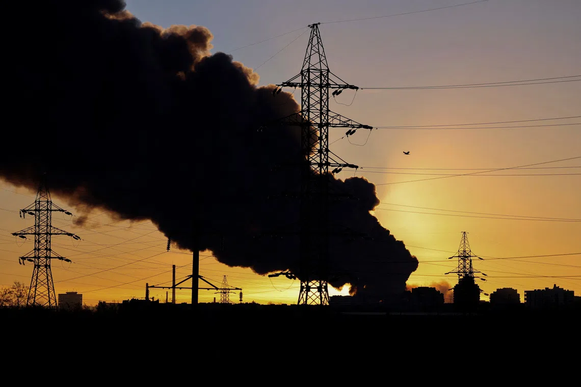 Smoke rising over the city after Russian missile and drone strikes in Lviv, Ukraine, on Nov 19.