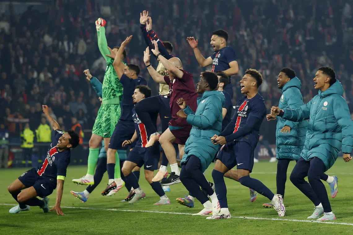 FILE PHOTO: Soccer Football - Champions League - Semi Final - Second Leg - Paris St Germain v Arsenal - Parc des Princes, Paris, France - May 7, 2025 Paris St Germain's Marquinhos celebrates with teammates after the match Action Images via Reuters/Peter Cziborra/File Photo