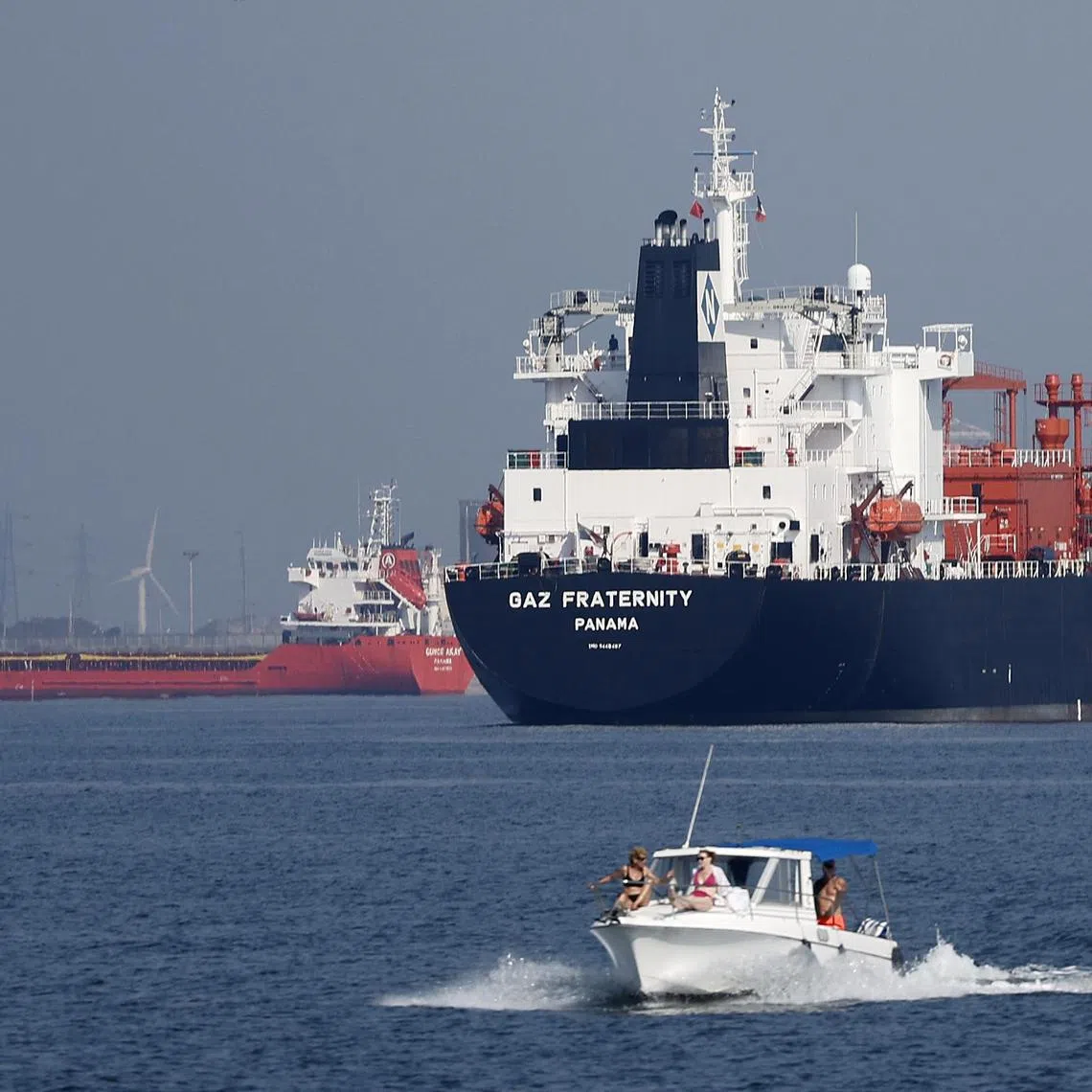 epa12192981 General view of oil refinery and tanker in Martigues, Southern France, 23 June 2025. Recent military escalation between Israel and Iran are raising fears of a potential closure of the Strait of Hormuz, a crucial waterway for global oil and gas trade. A closure could significantly impact global energy markets, causing a sharp increase in oil prices.  EPA/GUILLAUME HORCAJUELO
