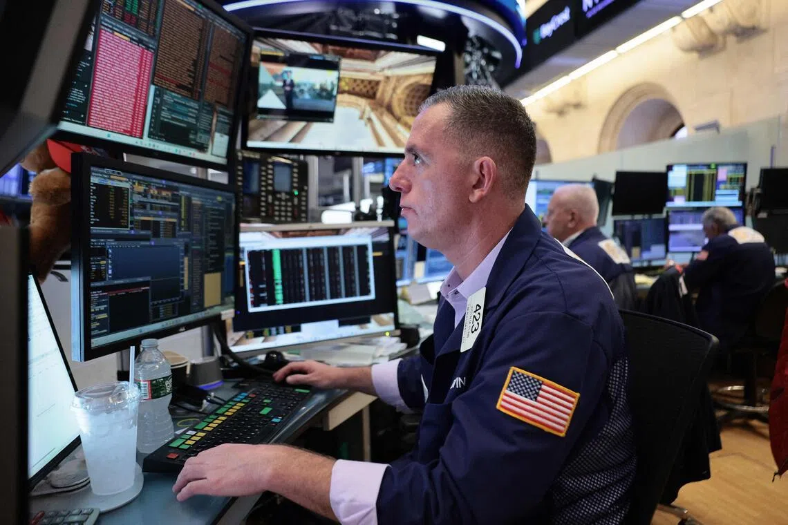 Traders working on the floor of the New York Stock Exchange, during morning trading on June 4,  in New York City. 