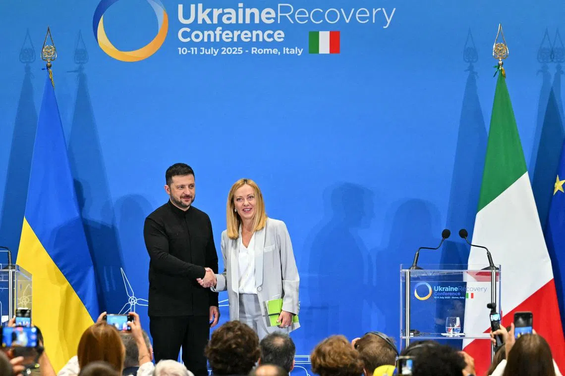 Ukrainian President Volodymyr Zelensky (left) and Italian Prime Minister Giorgia Meloni at the end of their July 10 press conference, part of The Ukraine Recovery Conference 2025 in Rome.