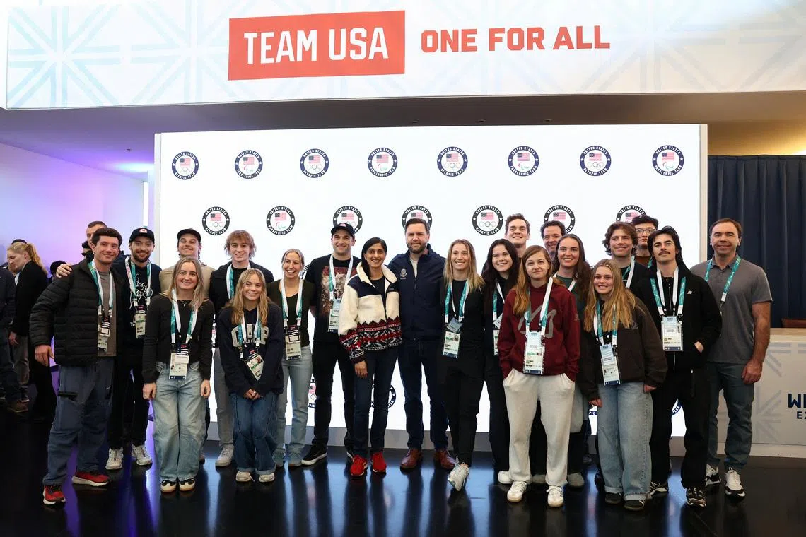 U.S. Vice President JD Vance and second lady Usha Vance pose for a photo with Team USA athletes, at the Team USA Welcome Experience, ahead of the Milano Cortina 2026 Winter Olympic Games in Milan, Italy, February 5, 2026. REUTERS/Kevin Lamarque/Pool