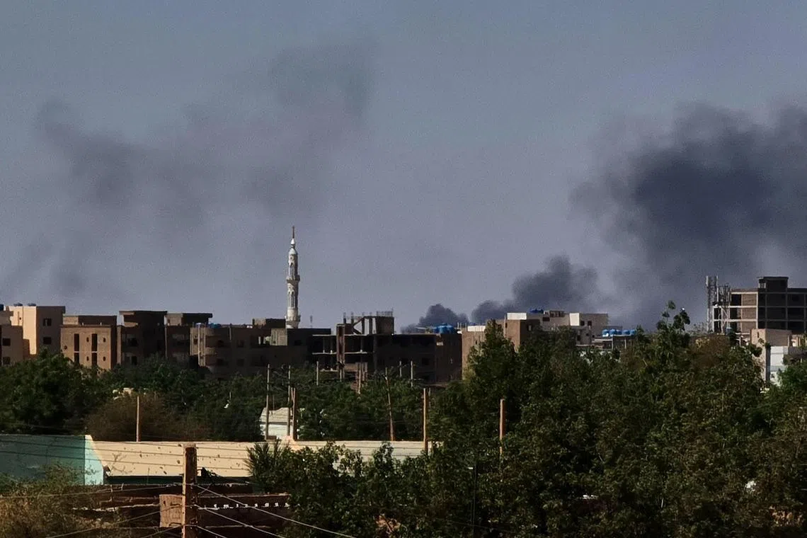 Smoke billows during fighting in the Sudanese capital Khartoum, on May 4, 2023. 