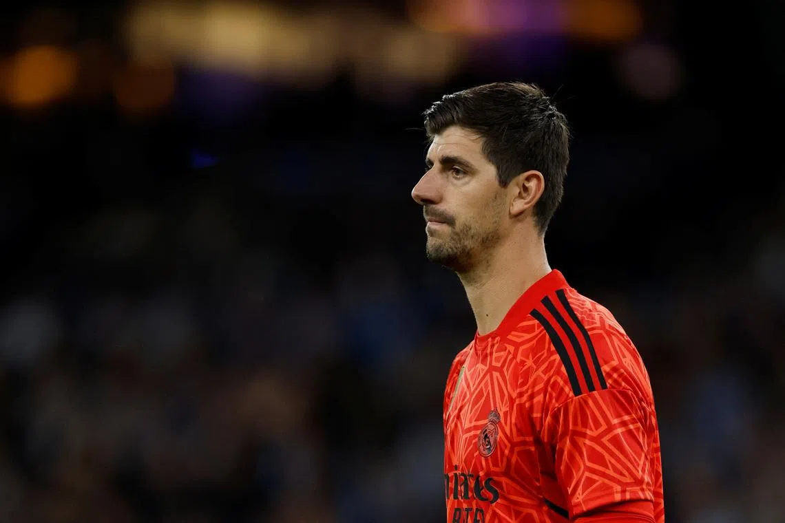 FILE PHOTO: Soccer Football - Champions League - Semi Final - Second Leg - Manchester City v Real Madrid - Etihad Stadium, Manchester, Britain - May 17, 2023  Real Madrid's Thibaut Courtois reacts Action Images via Reuters/Jason Cairnduff/File Photo