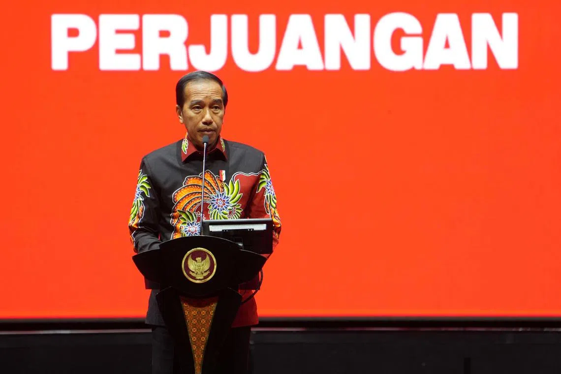  Indonesian President Joko Widodo, seen here at a political event on Jan 10, says that the government will seek to restore the rights of the victims who suffered human rights violations.  