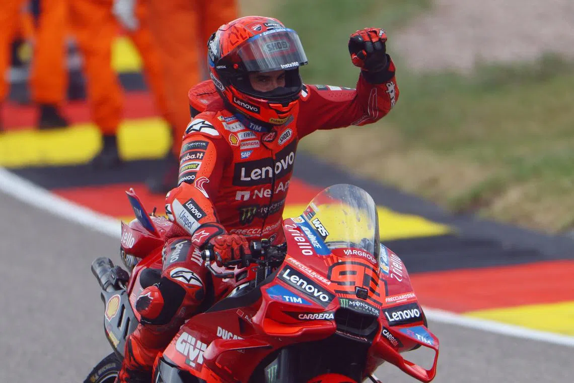 FILE PHOTO: MotoGP - German Grand Prix - Sachsenring, Hohenstein-Ernstthal, Germany - July 13, 2025 Ducati Lenovo Team's Marc Marquez celebrates winning the German Grand Prix REUTERS/Lisi Niesner/File Photo