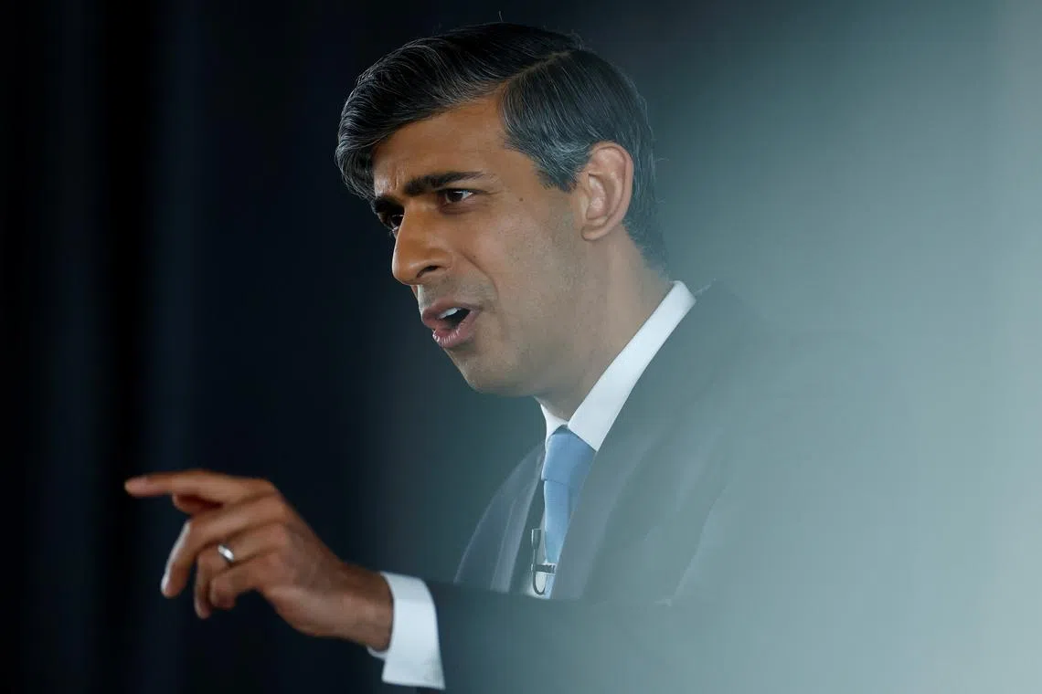 Britain's Prime Minister and Conservative Party leader Rishi Sunak delivers a speech to launch the Conservatives' general election manifesto in Silverstone, central England, on June 11, 2024.     BENJAMIN CREMEL/Pool via REUTERS