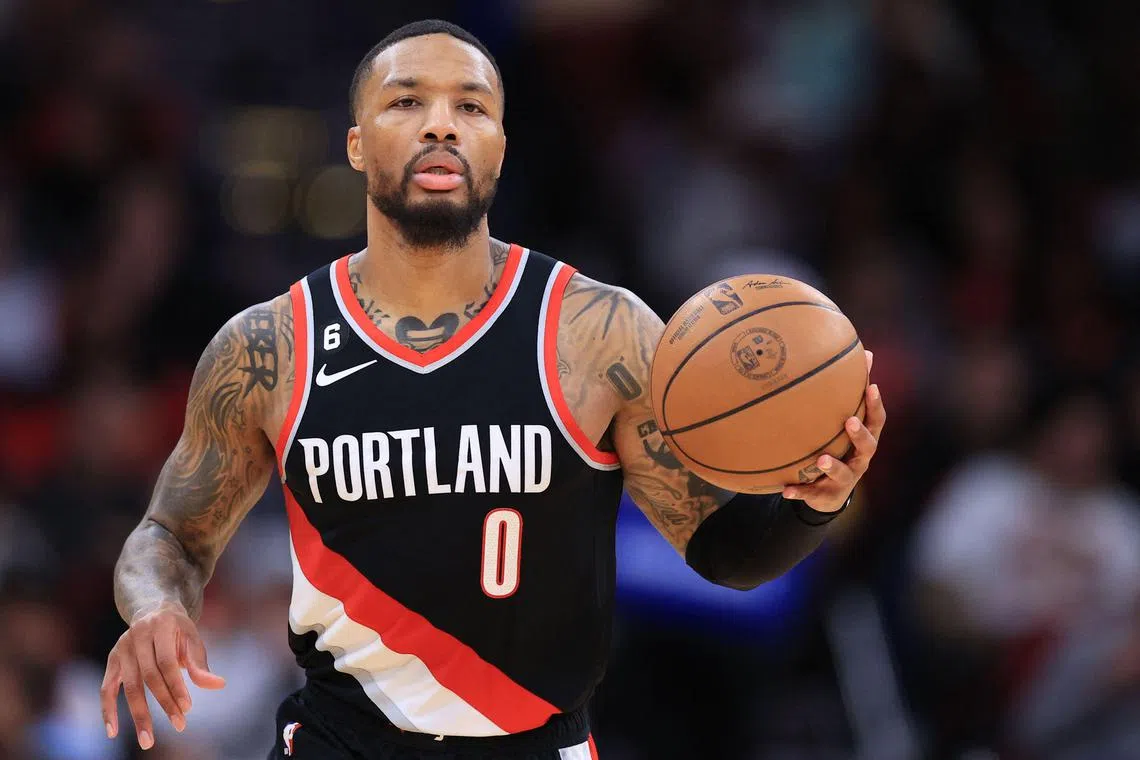 Damian Lillard of the Portland Trail Blazers, in action against the Houston Rockets, will be joining the Milwaukee Bucks. 