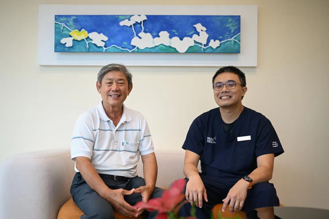 Construction supervisor Poh Chin Seng (left) with Dr James Lee, assistant group chief technology officer at NUHS.