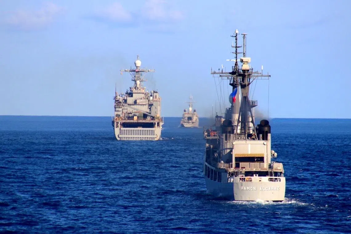 France’s FS Vendemiaire, the United States’ USS Harpers Ferry, and the Philippines’ BRP Ramon Alcaraz conduct a division tactics operation during the  at the start of the 10-dag multilateral maritime exercise for the annual Balikatan war games held off the coast of Palawan, Philippines on April 25, 2024.