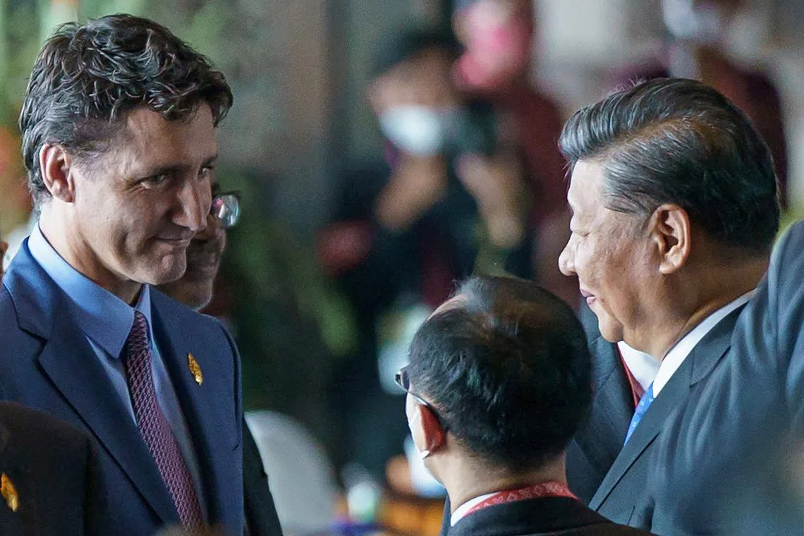 Canada's Prime Minister Justin Trudeau speaks with China's President Xi Jinping at the G20 Leaders' Summit in Bali, on Nov 15, 2022.