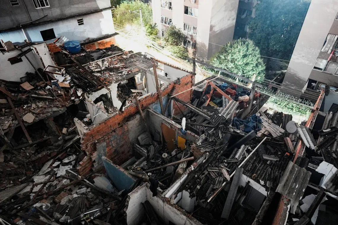 View of the site where a fire set off by a potential gas explosion damaged homes and injured people, according to the local fire department, in Sao Paulo, Brazil, May 11, 2026.