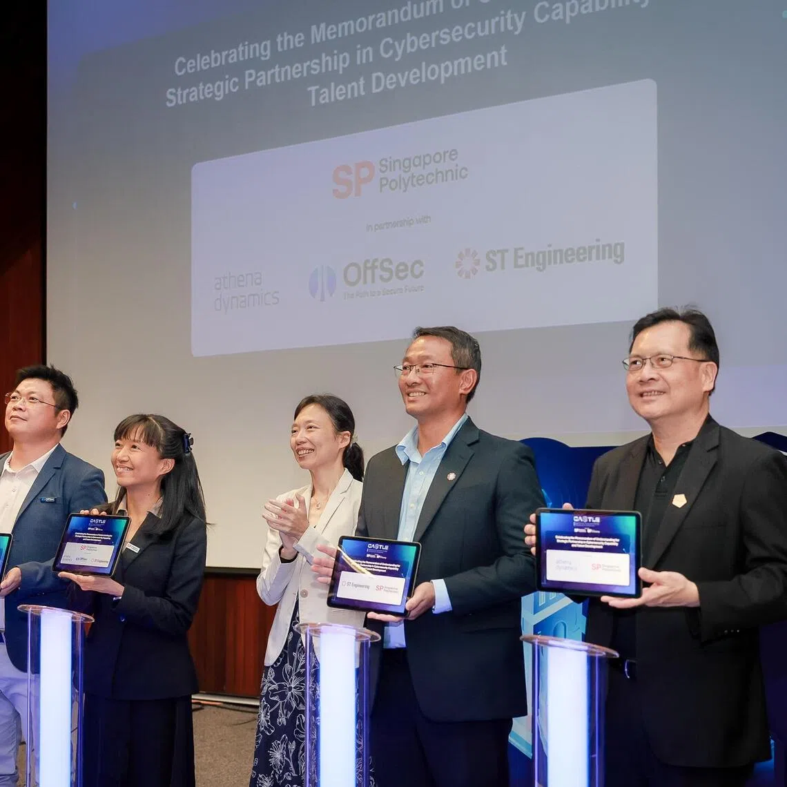 (From left) APAC Regional Director of OffSec Services LLC David Zhao; Deputy Principal of SP Tan Yen Yen; Acting Minister for Manpower Jasmin Lau; Head of Cyber Solutions & Infrastructure of ST Engineering Lim Meng Hwee; and CEO of Athena Dynamics Ken Soh during the launch of the Cybersecurity Assessment and Security Operations Centre Training Lab for Enterprises at Singapore Polytechnic on Aug 19.