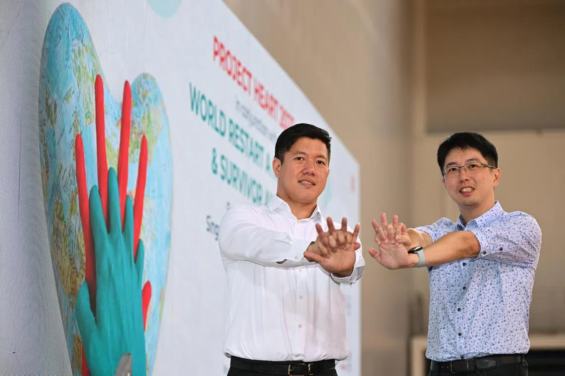 Engineer Lin Guang Min (left) and educator Jeremy Ang were among 34 recipients of the Survivor Awards Singapore 2023 at the Singapore Heart Foundation (SHF)’s Project Heart event.
