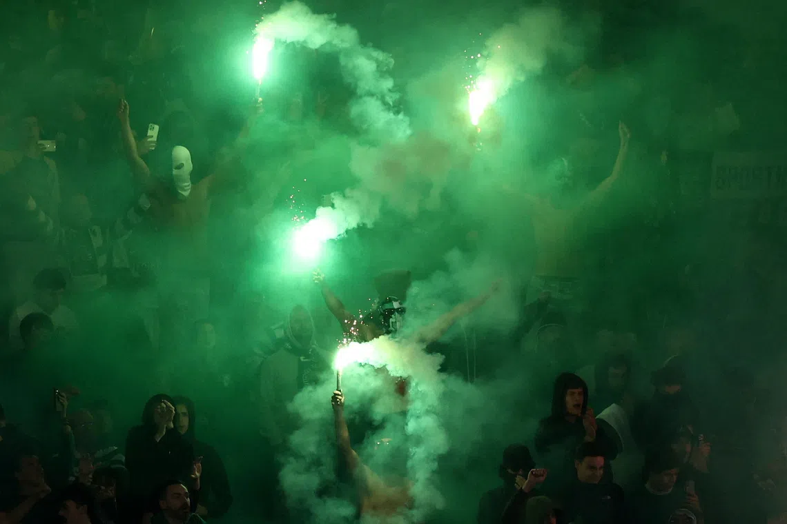 Sporting CP fans lighting up flares inside the Estadio Jose Alvalade in Lisbon, Portugal on Sept 22, 2025 