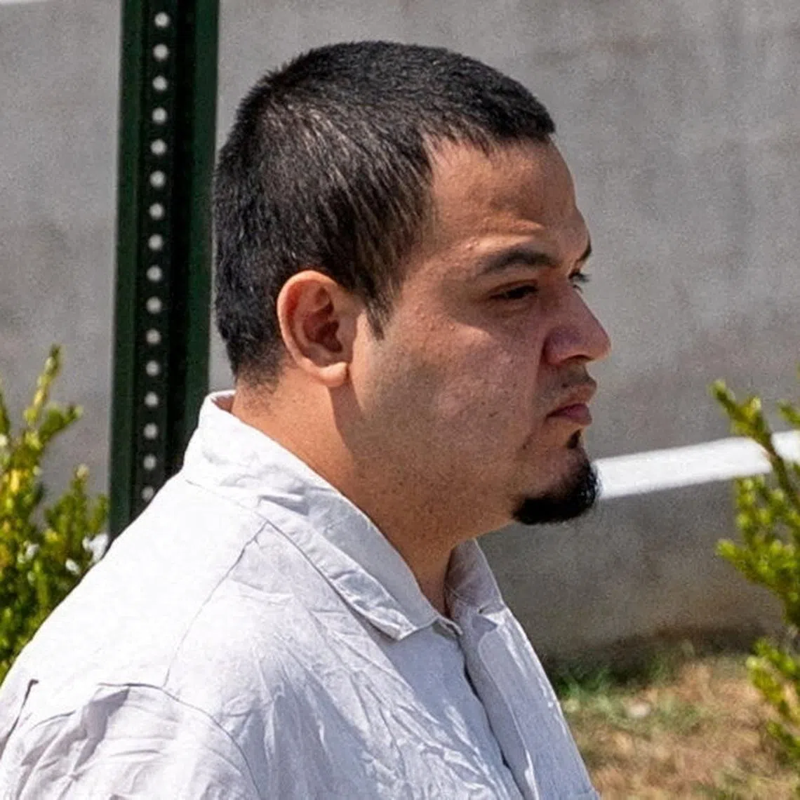 FILE PHOTO: Kilmar Abrego Garcia walks after he has been released from the Putnam County Jail in Cookeville, Tennessee, U.S., August 22, 2025.  REUTERS/Seth Herald/File Photo