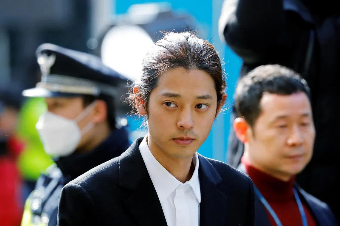 South Korean singer Jung Joon-young arrives for questioning on accusations of illicitly taping and sharing sex videos on social media, at the Seoul Metropolitan Police Agency in Seoul, South Korea, March 14, 2019.   REUTERS/Kim Hong-Ji