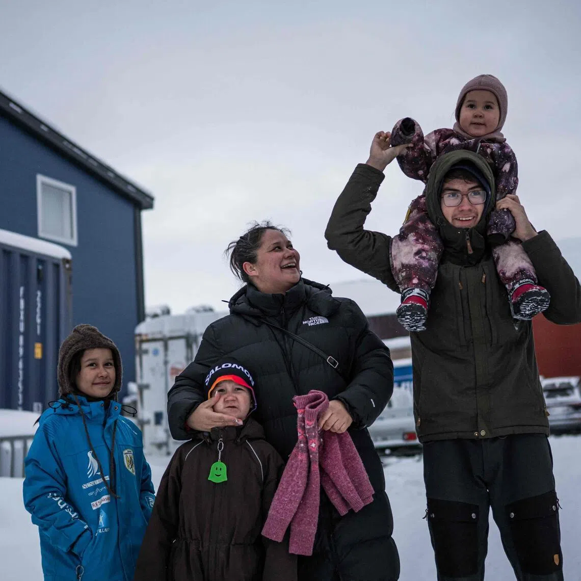 Ms Lykke Lynge and her kids are photographed in Nuuk, Greenland.