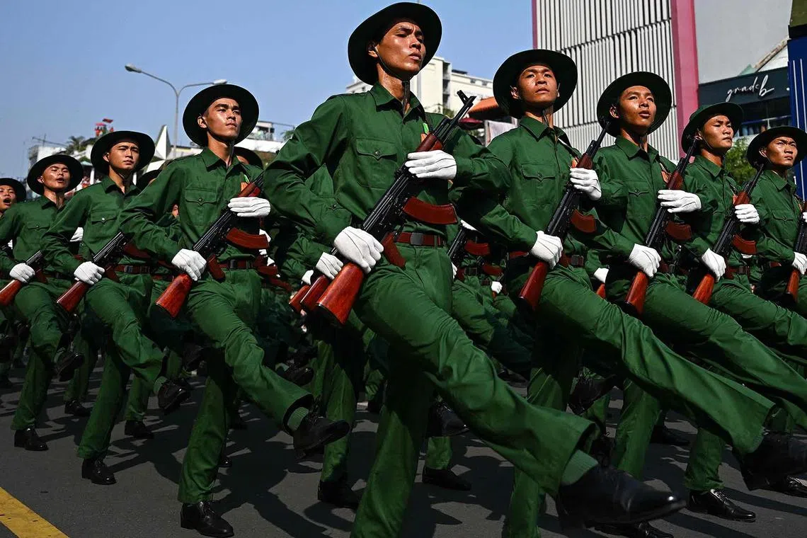 Soldiers marching during a parade marking the 50th anniversary of the fall of Saigon and the end of the Vietnam War in Ho Chi Minh City, April 30, 2025. 