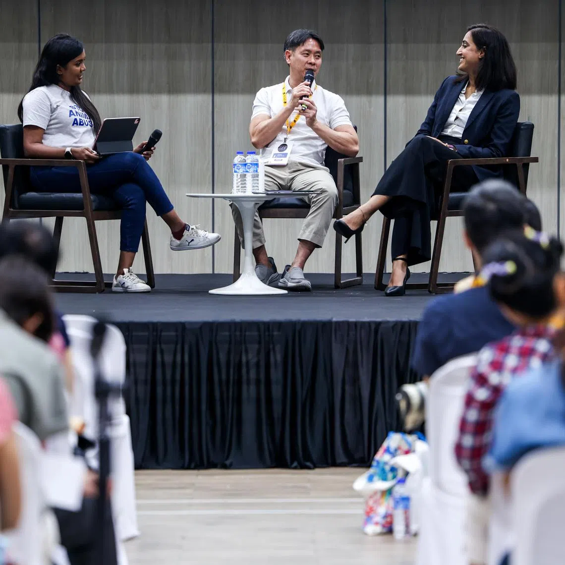 Discussing the challenges and progress of advancing animal welfare protection laws in Singapore are :Challenges and Progress with MP for the Nee Soon GRC Louis Ng (L) and Ms Sadhana Rai, Head of Representation, Pro Bono SG, SPCA Board Member (R), Moderated by Ms Aarthi Sankar, Executive Director, SPCA Singapore (in white), at the inaugural VOICE Conference held at Ngee Soon East CC on June 20th, 2024.