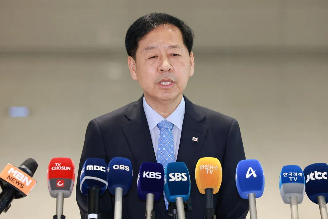 FILE PHOTO: South Korean Finance Minister Koo Yun-cheol speaks ahead of his departure to Washington to meet U.S. Treasury Secretary Scott Bessent, at the Incheon International Airport in Incheon, South Korea, July 29, 2025. Yonhap via REUTERS/File Photo