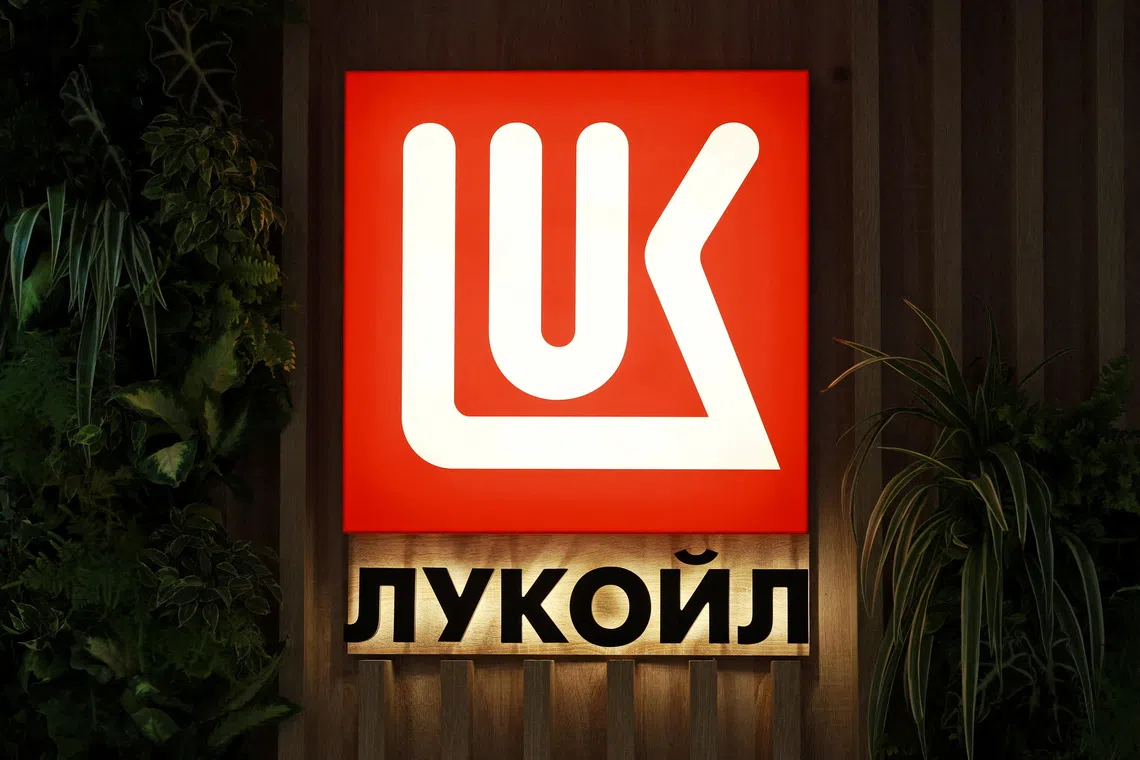 FILE PHOTO: A view shows a board with the logo of Lukoil company during the St. Petersburg International Economic Forum (SPIEF) in Saint Petersburg, Russia June 19, 2025. REUTERS/Anton Vaganov/File Photo