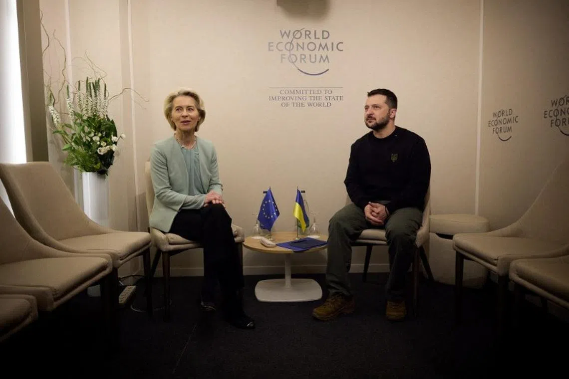 FILE PHOTO: Ukraine's President Volodymyr Zelenskiy and President of the European Commission Ursula von der Leyen attend a meeting during the World Economic Forum (WEF) in Davos, Switzerland January 16, 2024. Ukrainian Presidential Press Service/Handout via REUTERS/File Photo