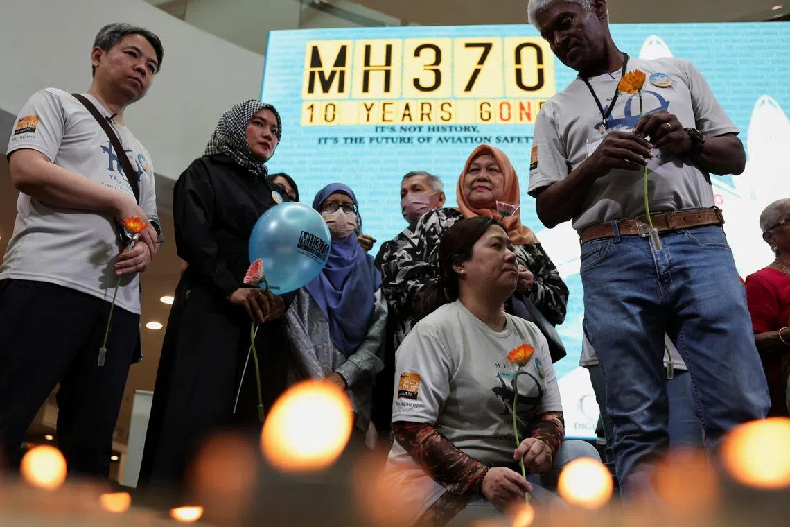 Families of passengers from both China and Malaysia, who were aboard the missing Malaysia Airlines flight MH370, are seen during a remembrance event commemorating the 10th anniversary of its disappearance, in Subang Jaya, Malaysia March 3, 2024. REUTERS/Hasnoor Hussain