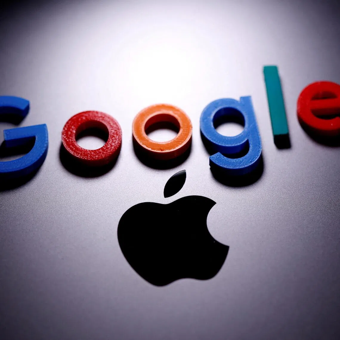 FILE PHOTO: A 3D printed Google logo is placed on the Apple Macbook in this illustration created on April 12, 2020. REUTERS/Dado Ruvic/Illustration/File Photo