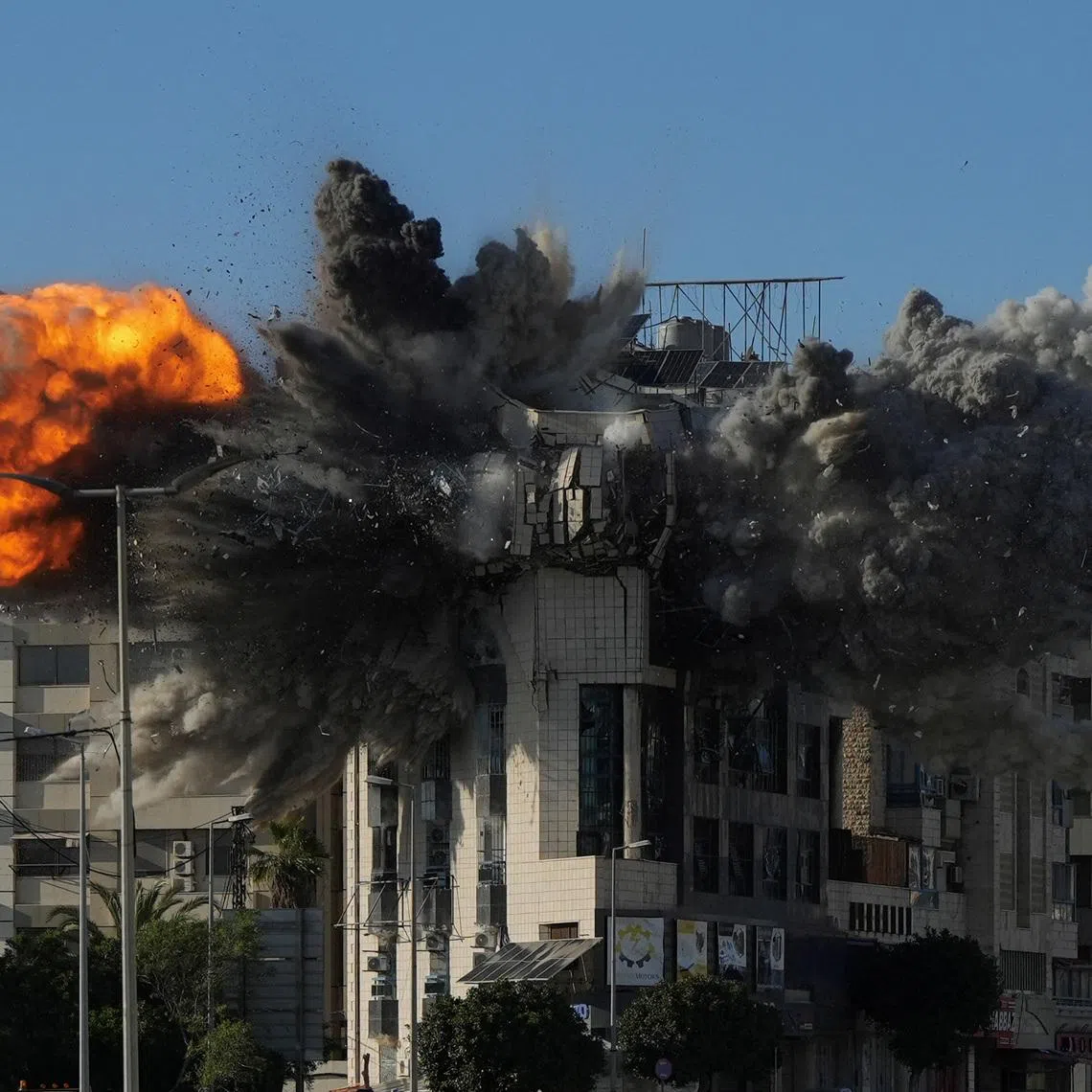 An explosion takes place in a building following an Israeli strike, amid escalating hostilities between Israel and Hezbollah, as the U.S.-Israel conflict with Iran continues, in Beirut, Lebanon, March 31, 2026. REUTERS/Mohammad Yassine