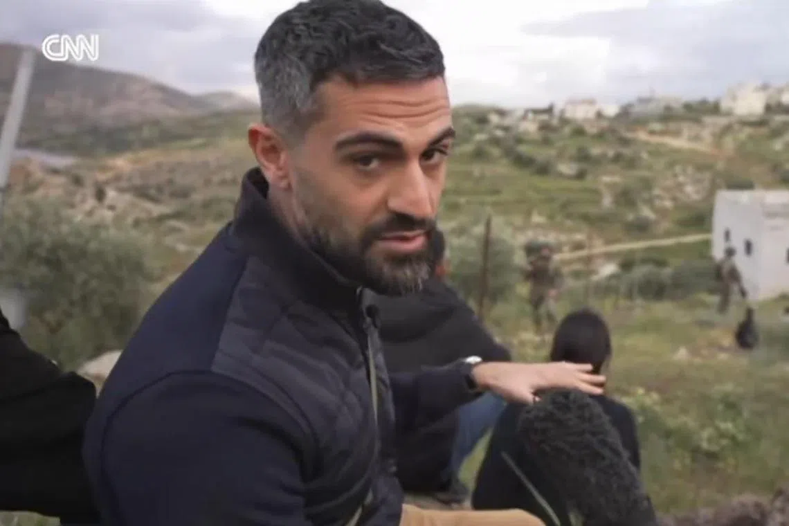 CNN journalist Jeremy Diamond addresses the camera as his team is approached by Israeli soldiers.